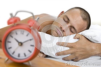 http://fr.dreamstime.com/homme-en-sommeil-avec-l-horloge-thumb12150917.jpg